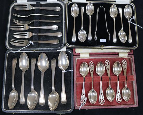 Four sets of cased silver flatware,